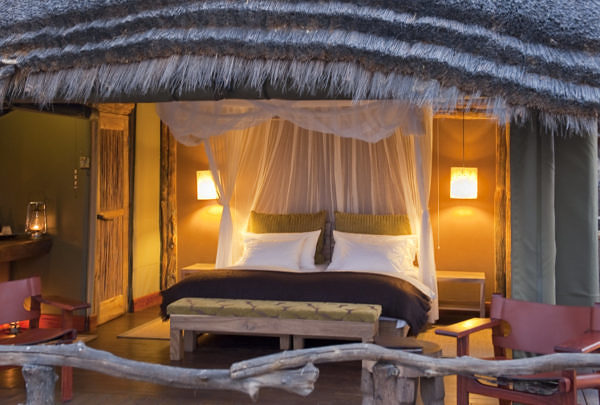 Onguma-Tree-Top-onguma-tree-top-camp-bedroom-night