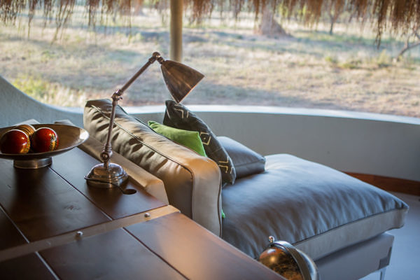 Okonjima-Luxury-Bush-Camp-bush-camp-room-lounge-lamp