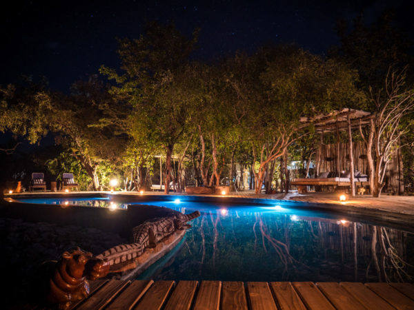Changa_Safari_Camp-3-swimming-pool-at-night-by-neil-fairlie